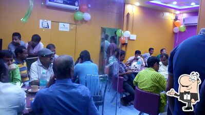 Take a seat at one of the tables at Bangaliana Restaurant