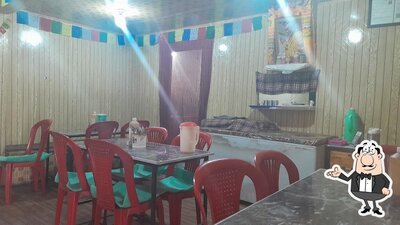 Take a seat at one of the tables at Namseling Restaurant