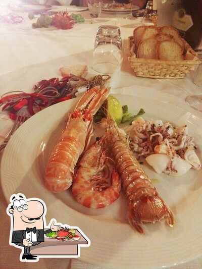 Prenditi tra i vari piatti di mare proposti al ristorante con griglia Ristorante Residence Europa