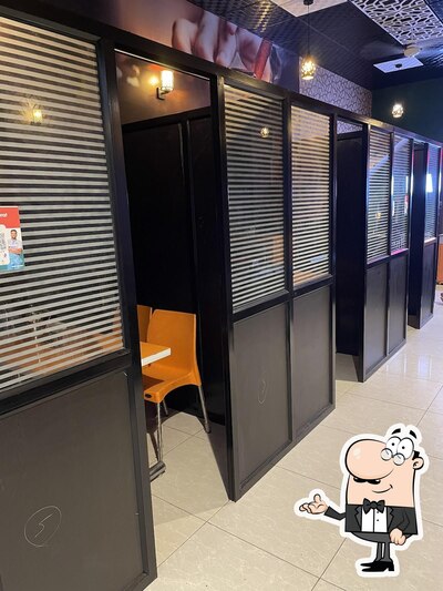 Take a seat at one of the tables at Barbeque Wing