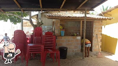 O interior do Toca do tatu, bar e restaurante