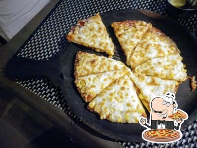 Order pizza at Pepper Tree restaurant