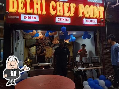 Take a seat at one of the tables at Delhi Chef Point