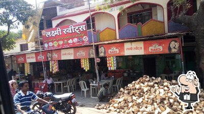 Take a seat at one of the tables at Shri Laxmi Sweets