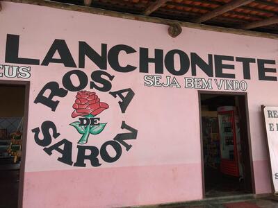 A representação visual da marca do Rosa de Saron - Restaurante e Lanchonete