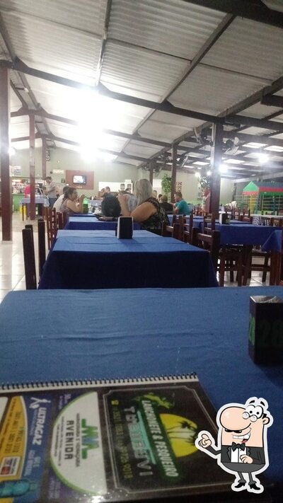 Sente em uma das mesas no Pesqueiro E Restaurante Tucuruvi
