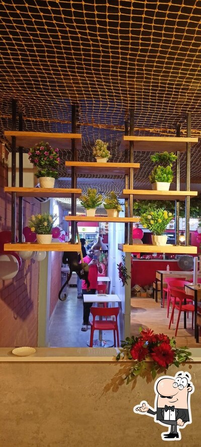 Take a seat at one of the tables at FC DEN'S Rayagada
