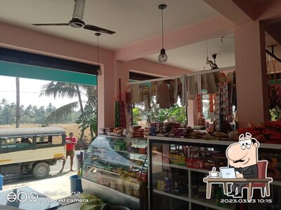 Take a seat at one of the tables at CHAKKITTAPARAMPIL BAKERY