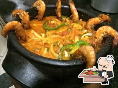 Escolha diversos refeições de frutos do mar servidos no Ponto de Encontro