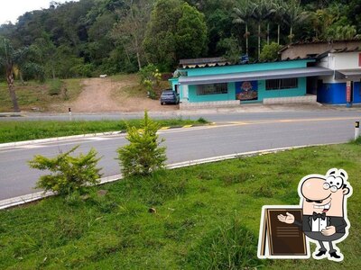 Você pode espairecer no na área externa do New Pizzas