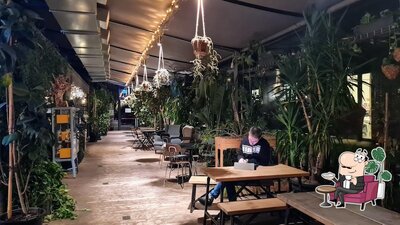Siediti a un tavolo di La Serra - Greenhouse