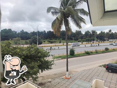 The exterior is an important feature of Friends Lodging & Boarding, Deluxe Rooms Hotel Near Bangalore Airport Road, Attached Family Restaurant in Devanahalli Road