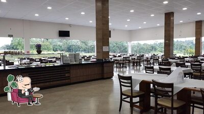 O interior do Restaurante Cacique Grill