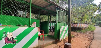 Check out how ഹായ് തട്ടുകട- നാടൻ കോഴി പേരട്ട് looks inside