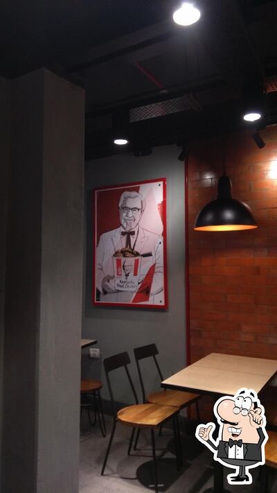 Take a seat at one of the tables at KFC