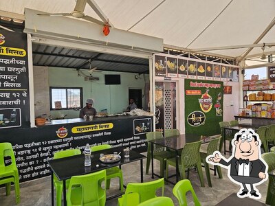 Take a seat at one of the tables at Mahabarachi Misal