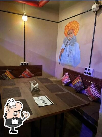Take a seat at one of the tables at The Dice Restaurant