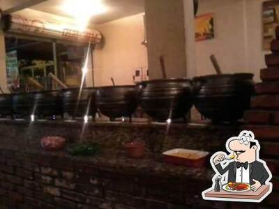 Comida em Vaca Atolada
