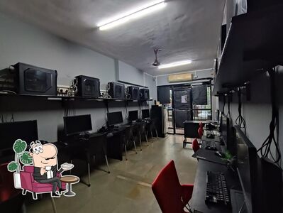 Take a seat at one of the tables at Level Up Gaming Cafe