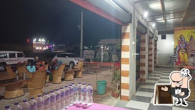You can get some fresh air outside Aasha Restaurant