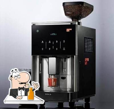Enjoy a drink at coffee day vending machine