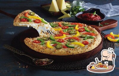 Try out pizza at Domino's Pizza