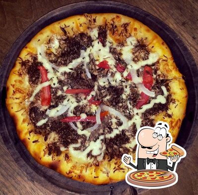 Consiga pizza no Petisco's Pizzaria E A La Carte