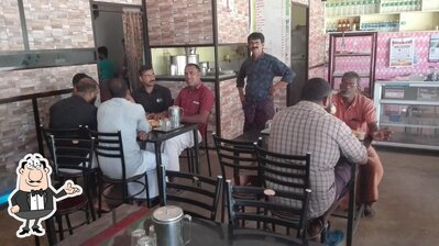 Take a seat at one of the tables at Green Chilli Restaurant