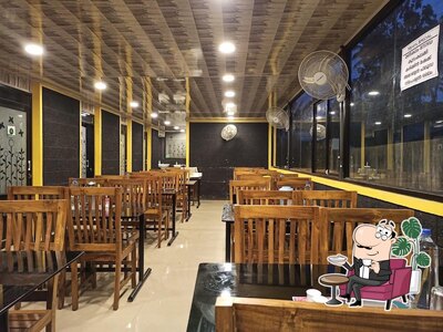 Take a seat at one of the tables at Mehfil family restaurant