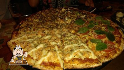 Experimente pizza no pizzaria Capitão Mainha