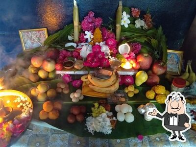 Take a seat at one of the tables at Gamana South Indian Restaurant