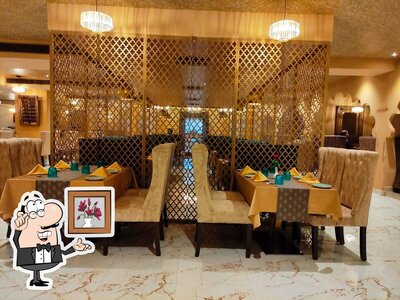 Take a seat at one of the tables at Viraasat (Ranjitha Palace)