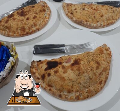 Escolha pizza no Pizzaria Laguna
