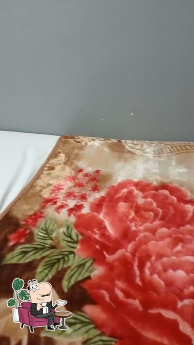 Take a seat at one of the tables at HOTEL MANOKAMNA