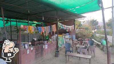 Take a seat at one of the tables at Mevaad chicken corner