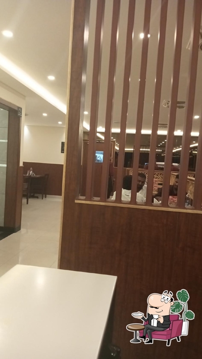 Take a seat at one of the tables at Empire Restaurant