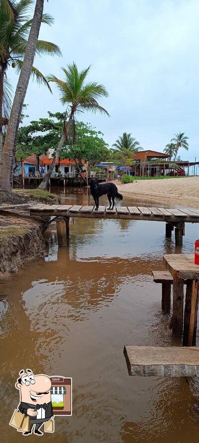 Você pode espairecer no na área externa do Toca do tatu, bar e restaurante
