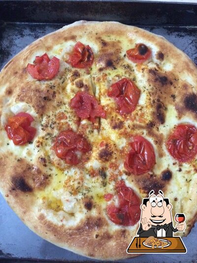 Prenditi una pizza al ristorante Pizzeria L'Angolo