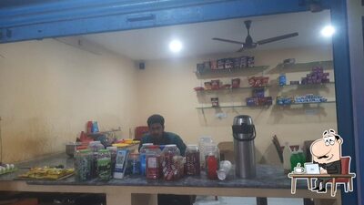 Take a seat at one of the tables at BALA 'S RICE 'N' SPICY