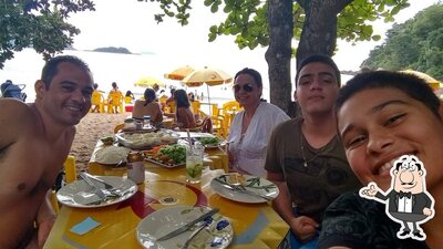 Sente em uma das mesas no Rancho Do Betum