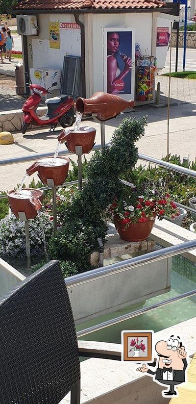 Siediti a un tavolo di Hotel Scala d'Oro/B&B Scala