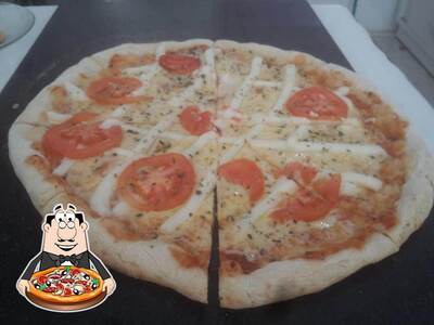 No Pizzaria Manjericão, você pode provar pizza