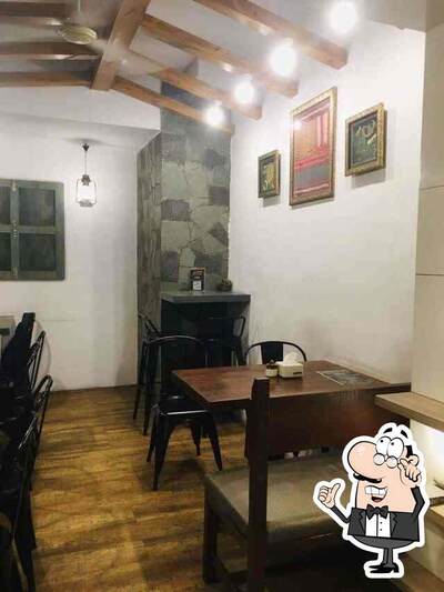 Take a seat at one of the tables at MH-09 Shetkari LLP