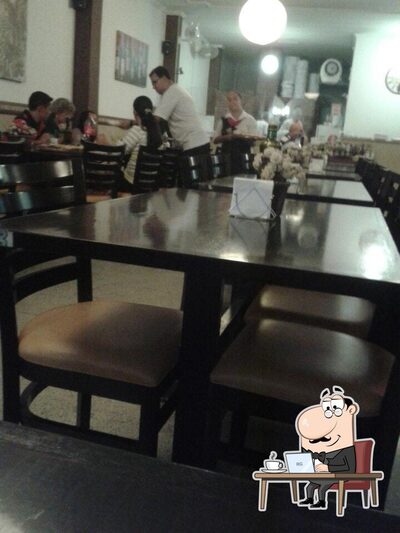 O interior do Pizzaria Napole