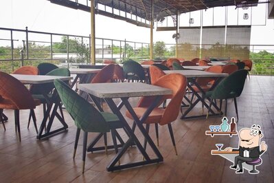 Take a seat at one of the tables at Mocha Mania cafe