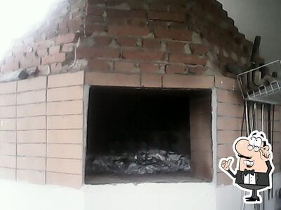 O interior do Pizzaria Castelinho