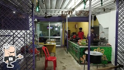 Take a seat at one of the tables at The Green Chillz