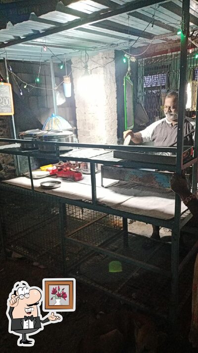 Take a seat at one of the tables at kurshid Chicken Pakoda