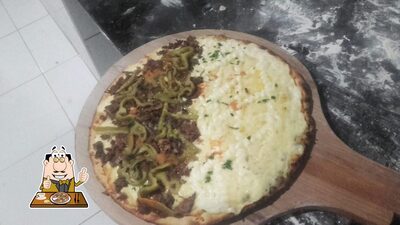 No Siracusa Pizzaria, você pode desfrutar de pizza