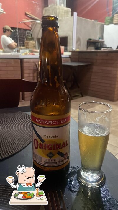 Comida em Tchelos pizzaria